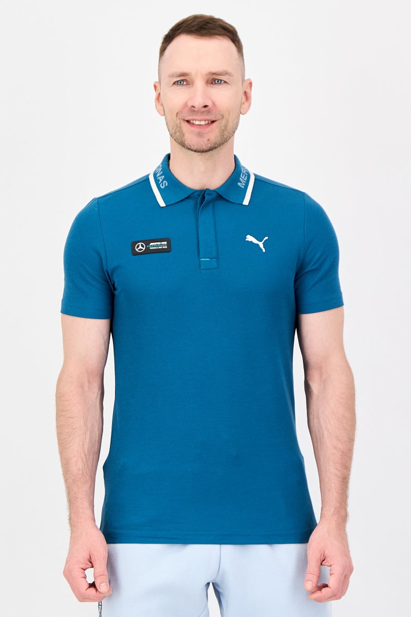 PUMA Men Sportswear Fit Short Sleeve Outdoor Polo Shirt, Teal Blue - Image 1